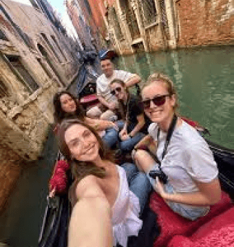 Friends exploring Venice canals